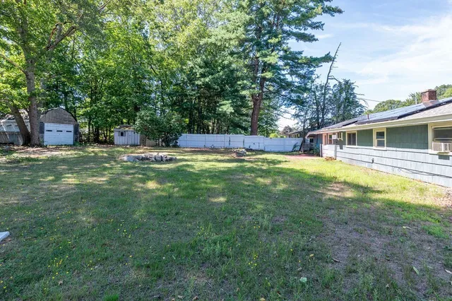 a view of a house with a big yard