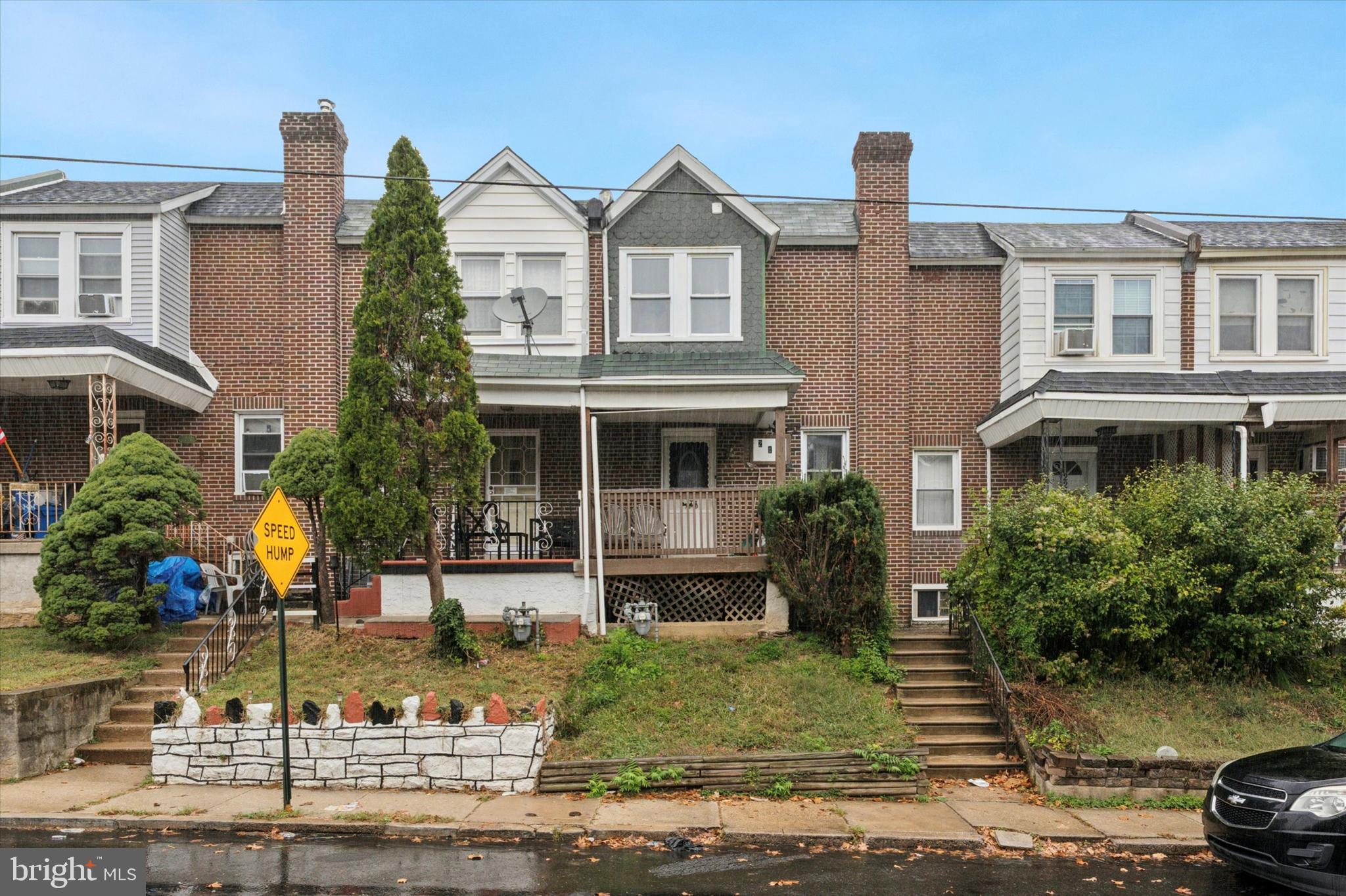 219 Laurel Road Sharon Hill, PA 19079 - Photo 13 of 15 a front view of a house with a yard