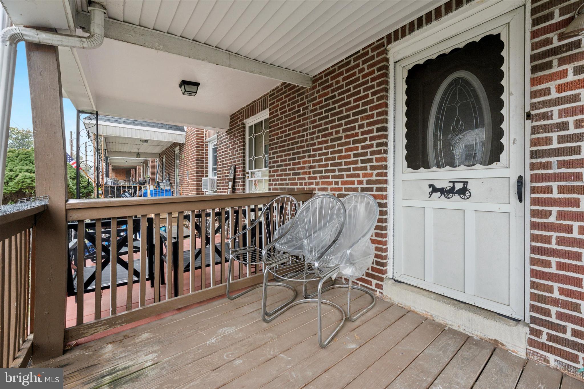 219 Laurel Road Sharon Hill, PA 19079 - Photo 15 of 15 a view of a chair and table in the balcony