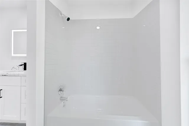 a bathroom with a bathtub