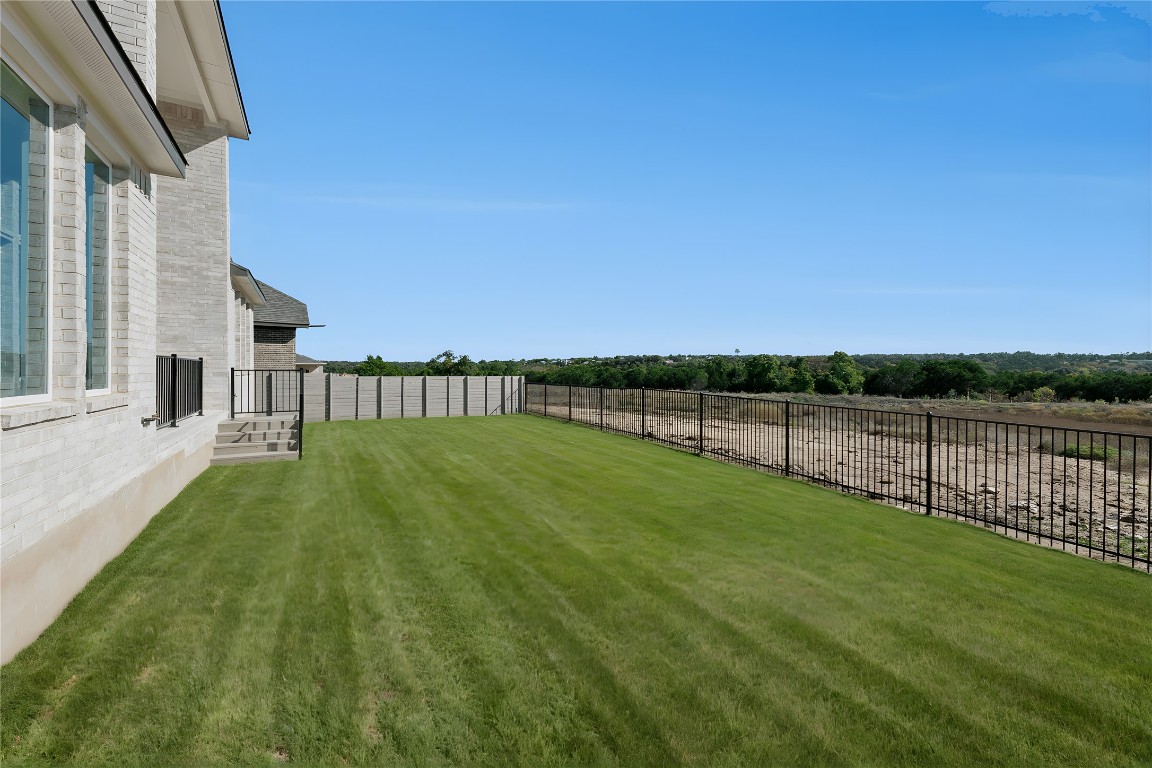 1533 Rodeo Ridge Drive Georgetown, TX 78628 - Photo 27 of 34 View of fenced backyard