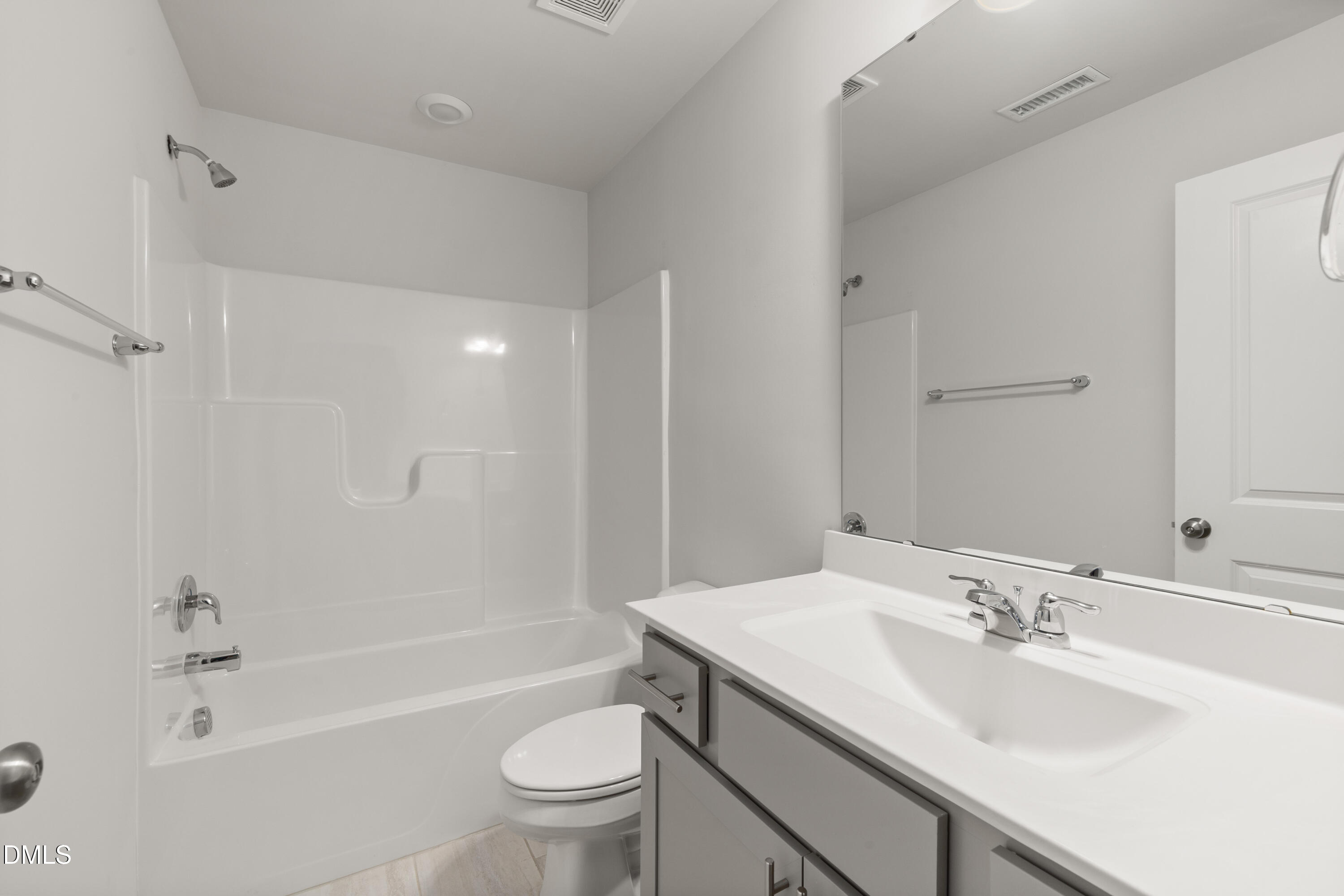 2524 Laurel Valley Way Raleigh, NC 27604 - Photo 10 of 12 a bathroom with a granite countertop sink a toilet and shower