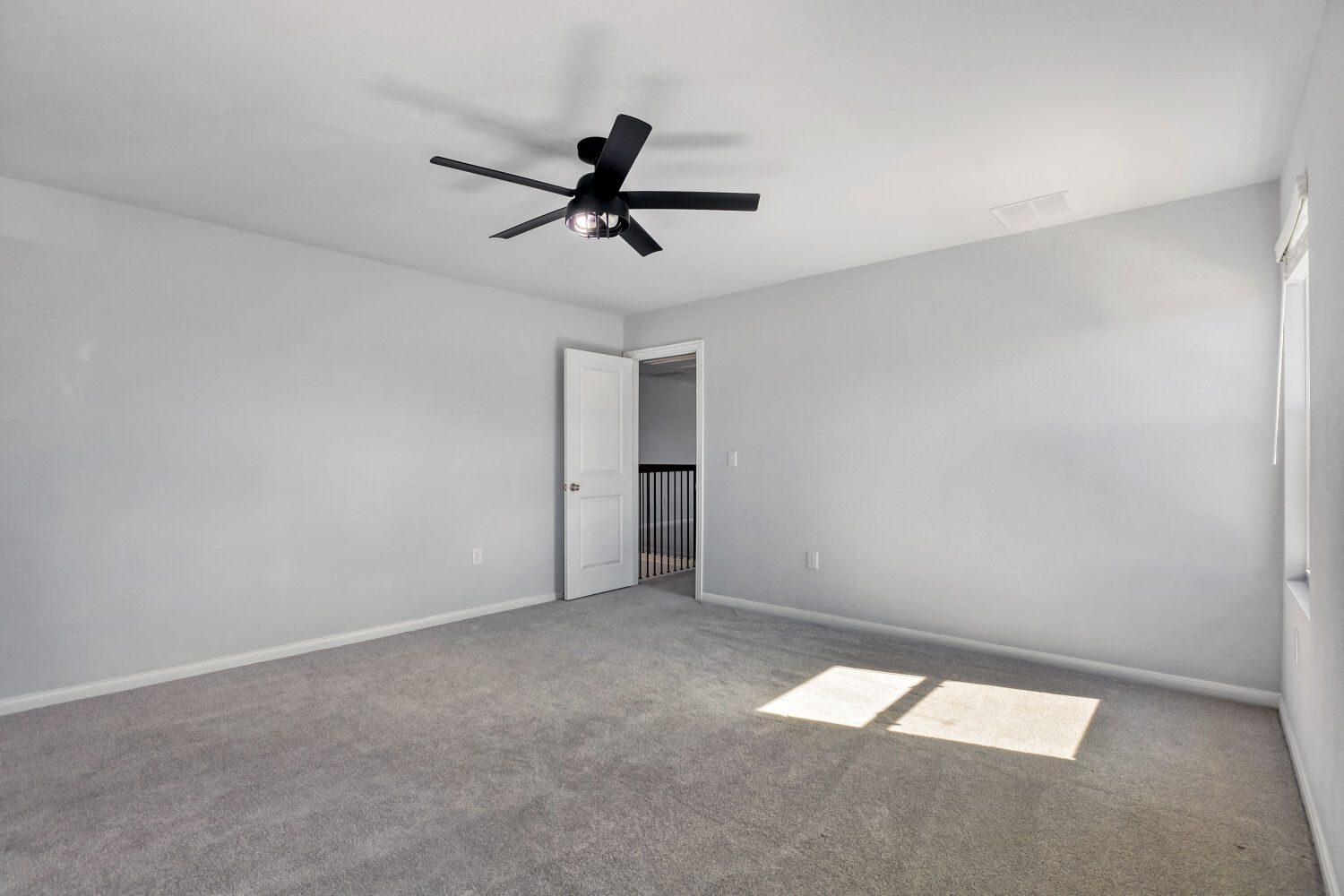 6601 Avila Way Pflugerville, TX 78660 - Photo 17 of 28 Unfurnished bedroom featuring carpet flooring and a ceiling fan