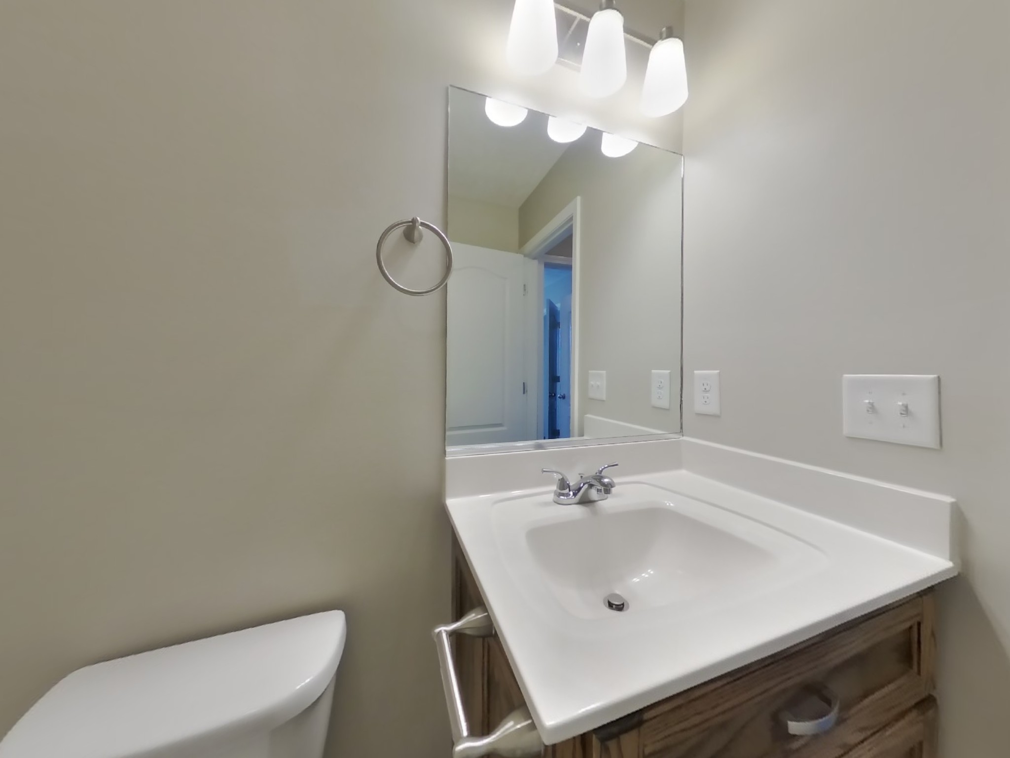 1908 Susan Road Columbia, TN 38401 - Photo 13 of 15 a bathroom with a sink vanity mirror and toilet