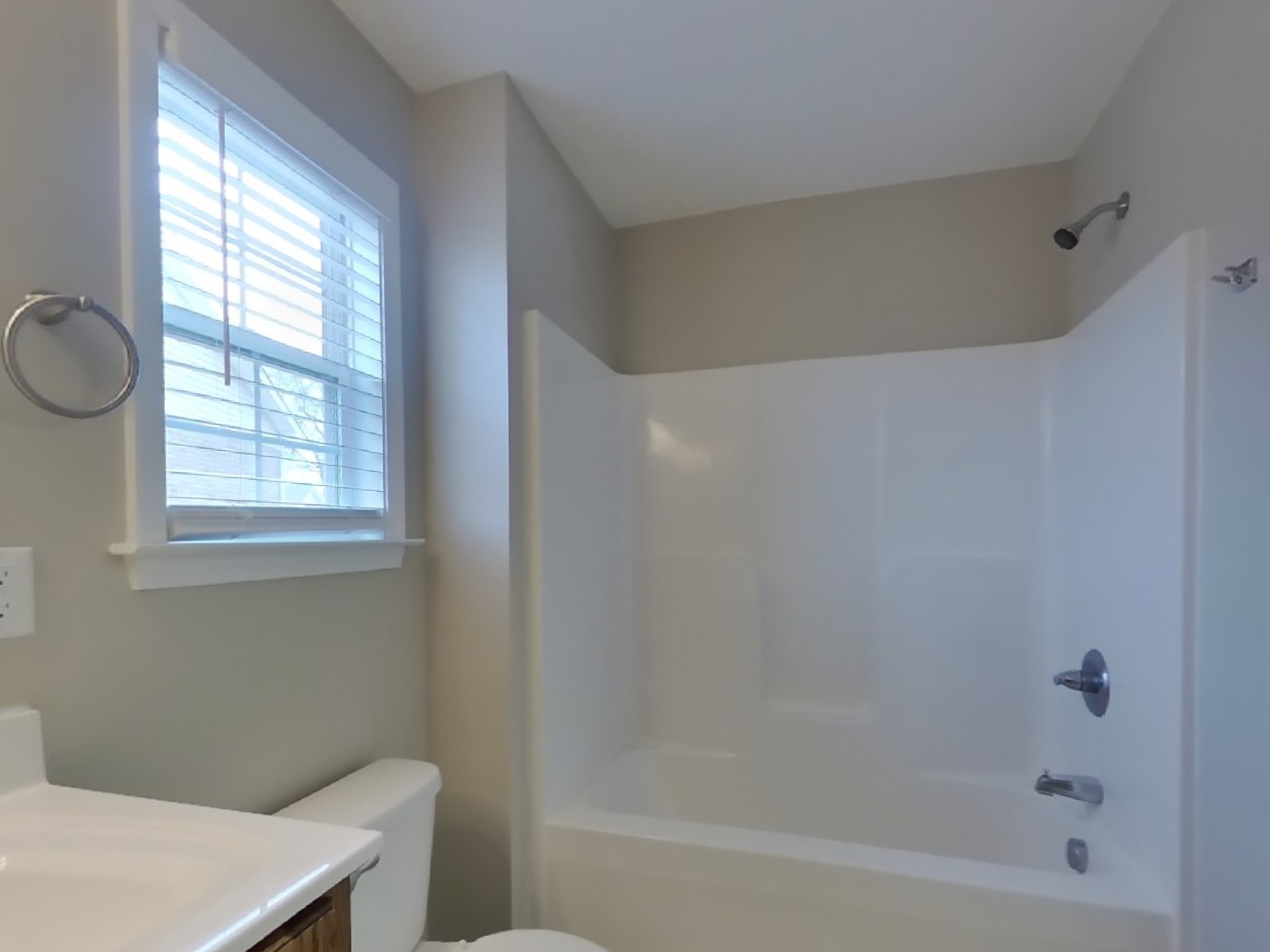 1908 Susan Road Columbia, TN 38401 - Photo 8 of 15 a bathroom with a bathtub a window and a shower