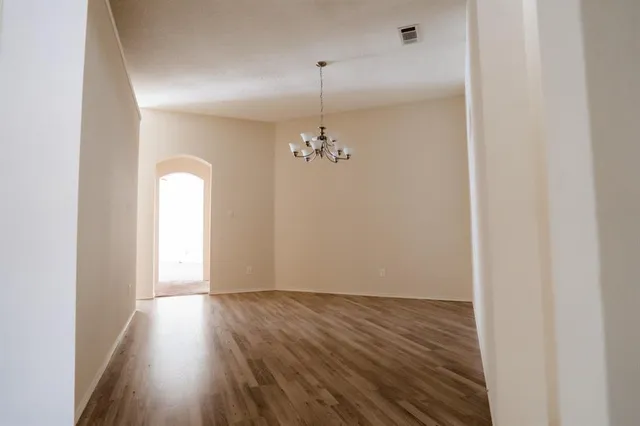 a backyard of a house with lots of green space