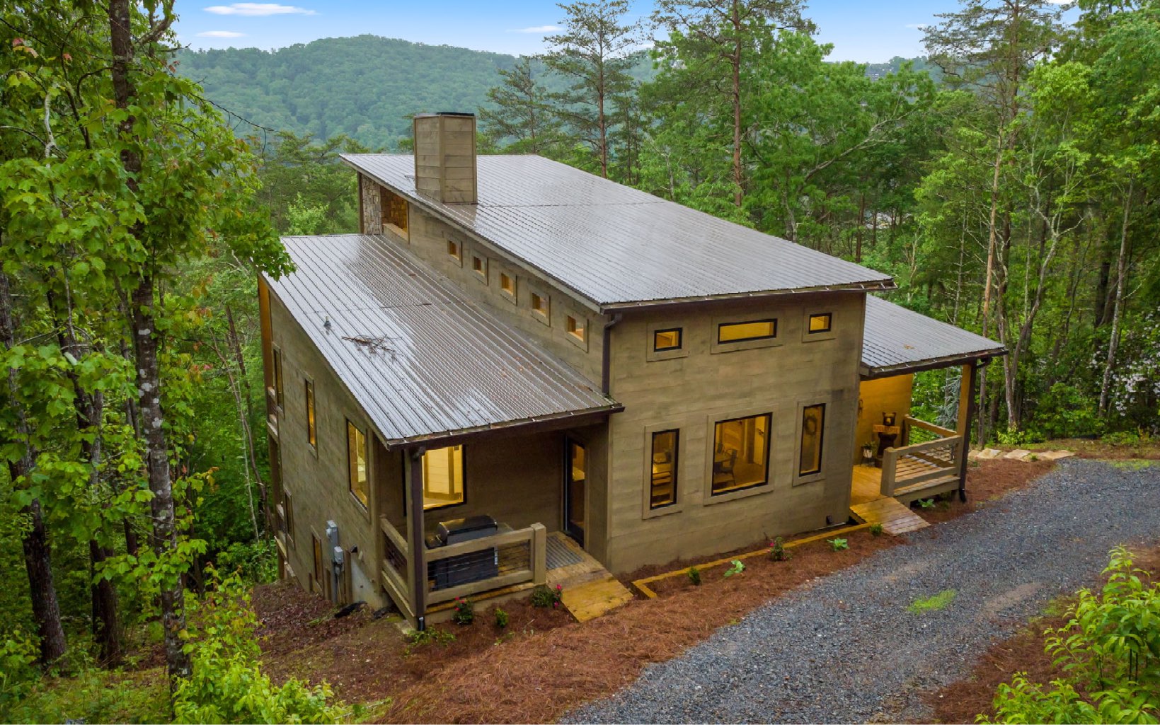 259 Mountain Laurel Lane Blue Ridge, GA 30513 - Photo 5 of 60 a view of a house with a yard balcony and outdoor seating