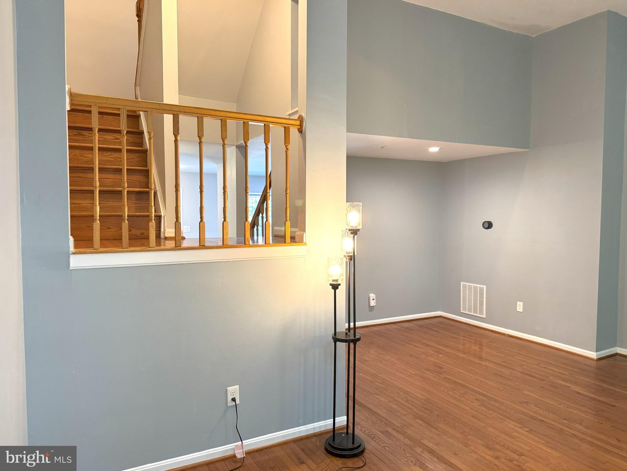 618 Evening Star Place Bowie, MD 20721 - Photo 15 of 59 wooden floor and window in an empty room