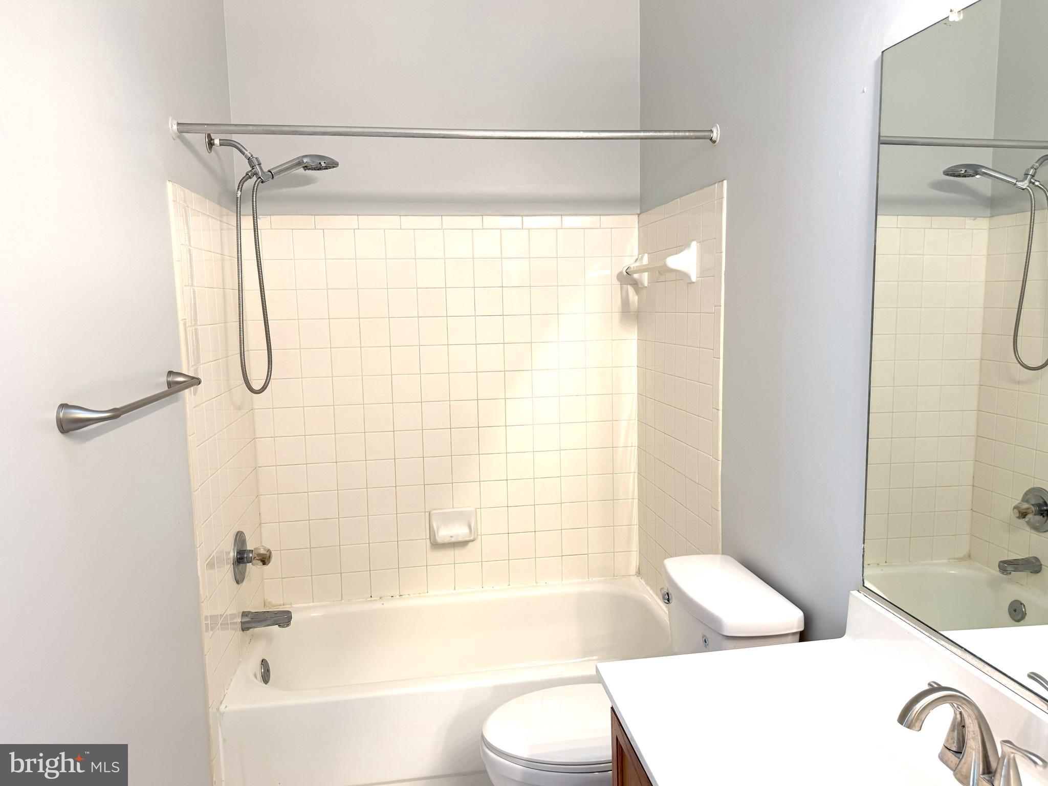 618 Evening Star Place Bowie, MD 20721 - Photo 24 of 59 a bathroom with a bathtub and a shower