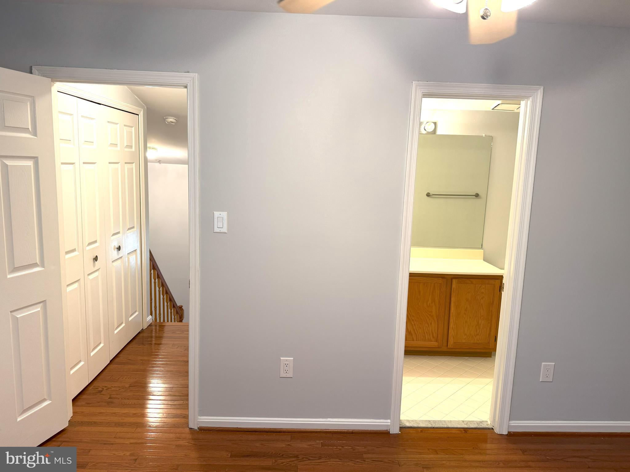 618 Evening Star Place Bowie, MD 20721 - Photo 28 of 59 a view of an empty room with wooden floor and a window