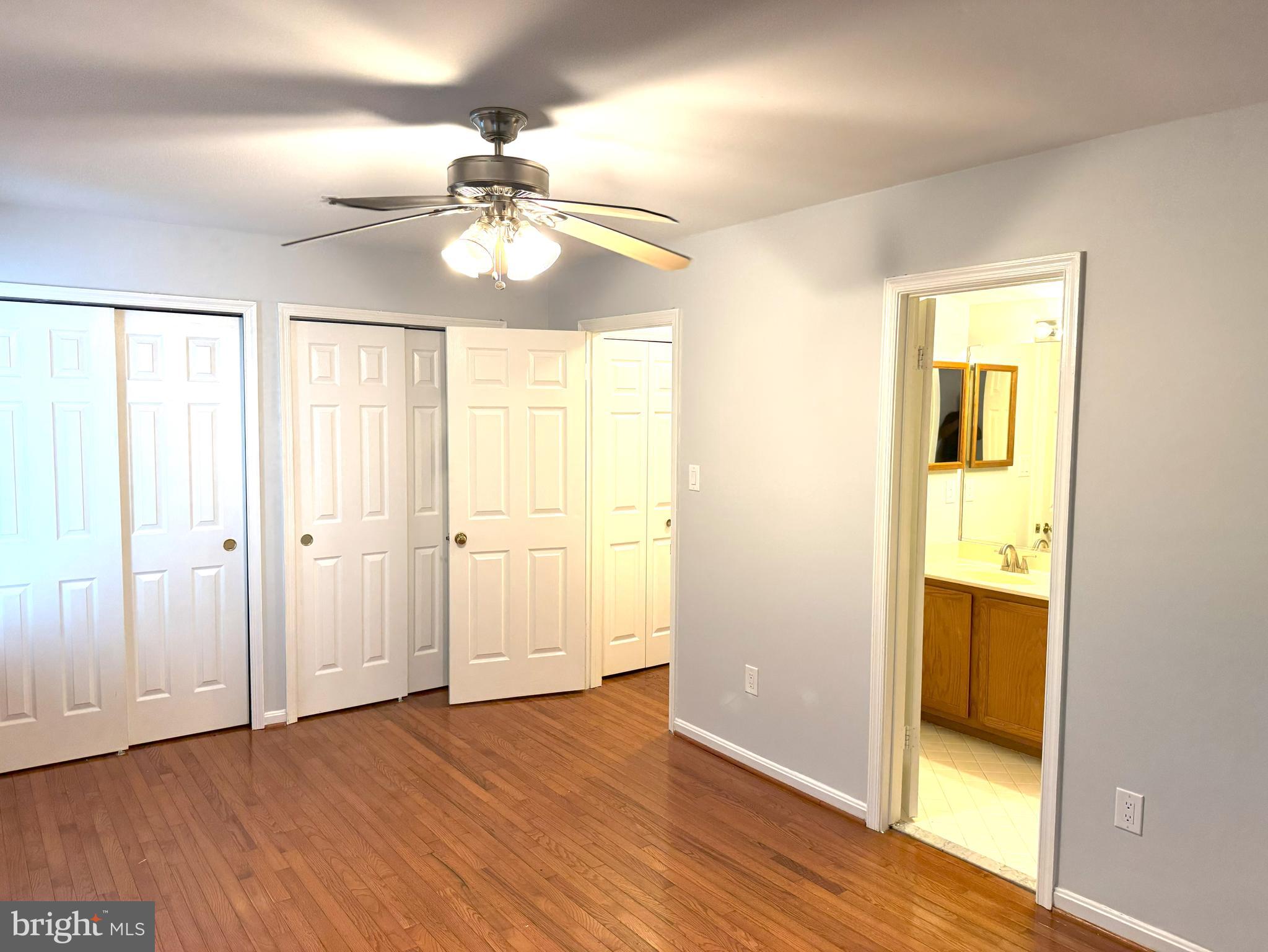 618 Evening Star Place Bowie, MD 20721 - Photo 3 of 59 wooden floor in an empty room with a window