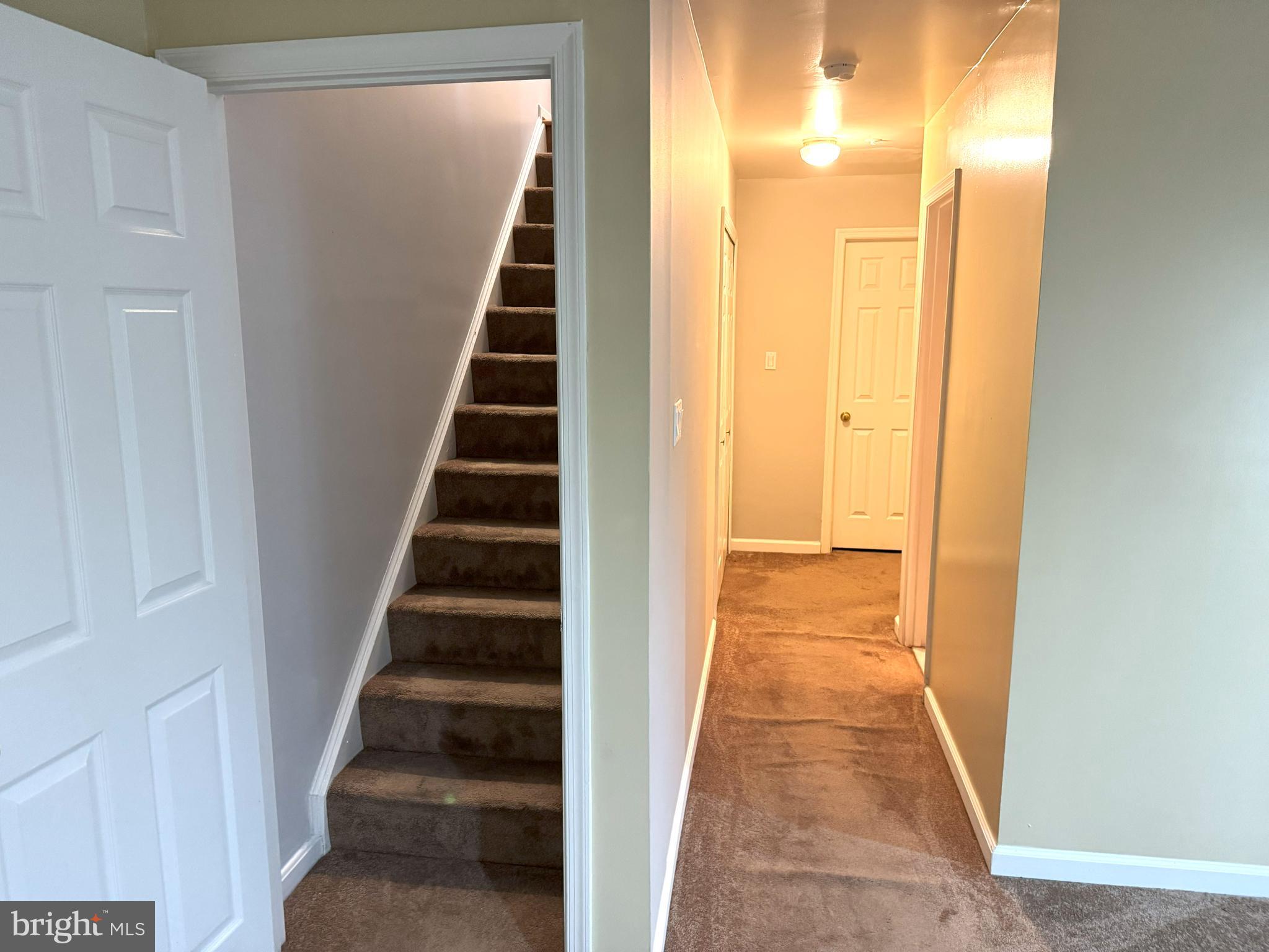 618 Evening Star Place Bowie, MD 20721 - Photo 45 of 59 a view of a hallway with wooden floor and entryway