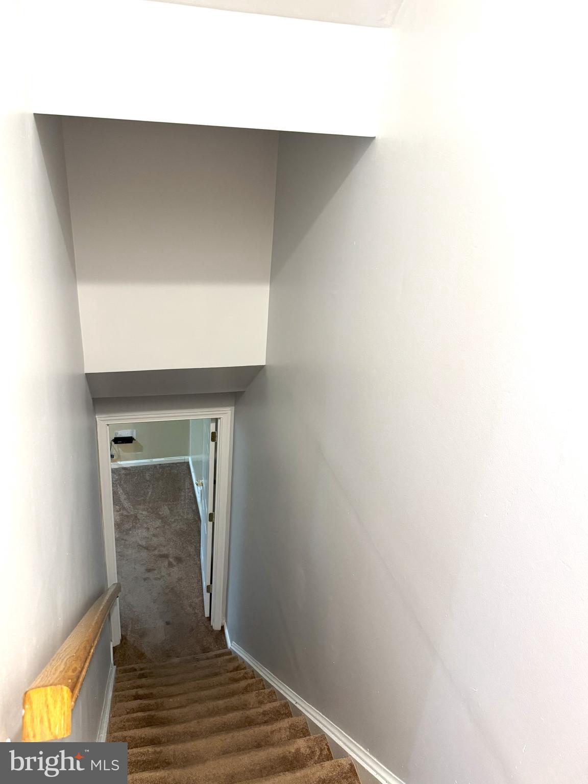 618 Evening Star Place Bowie, MD 20721 - Photo 46 of 59 a view of hallway with wooden floor