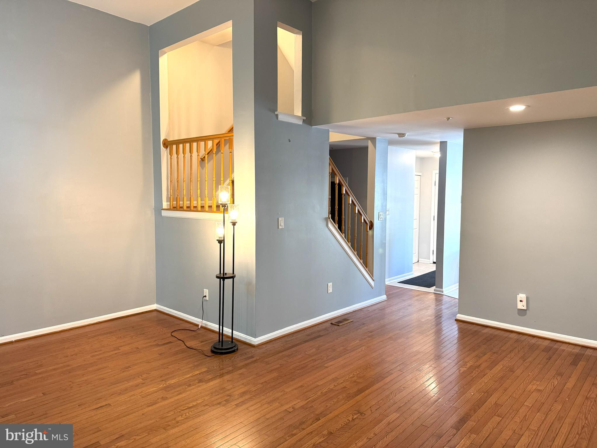618 Evening Star Place Bowie, MD 20721 - Photo 48 of 59 wooden floor in an empty room with a window