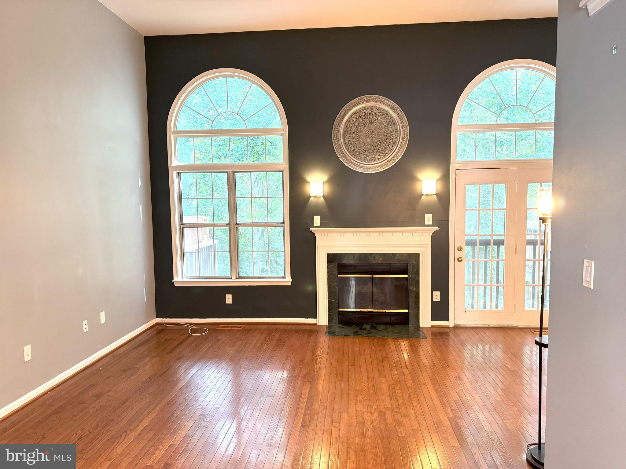 618 Evening Star Place Bowie, MD 20721 - Photo 57 of 59 a view of a livingroom with furniture and a fireplace