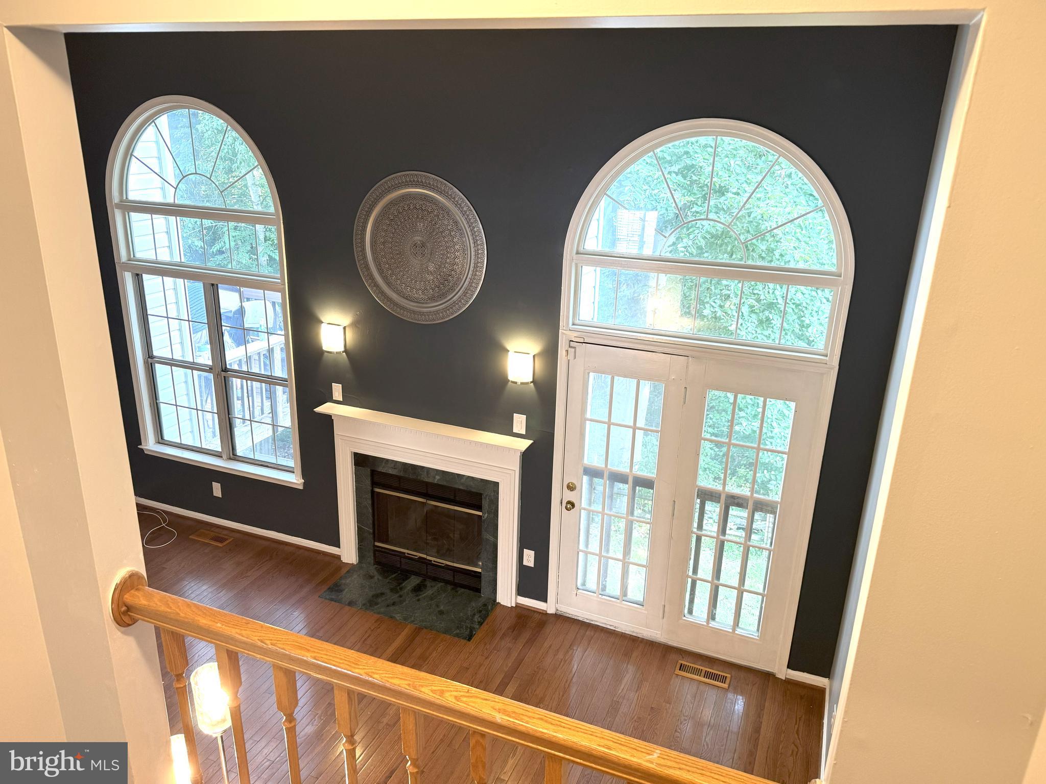 618 Evening Star Place Bowie, MD 20721 - Photo 8 of 59 a view of a fireplace and a window