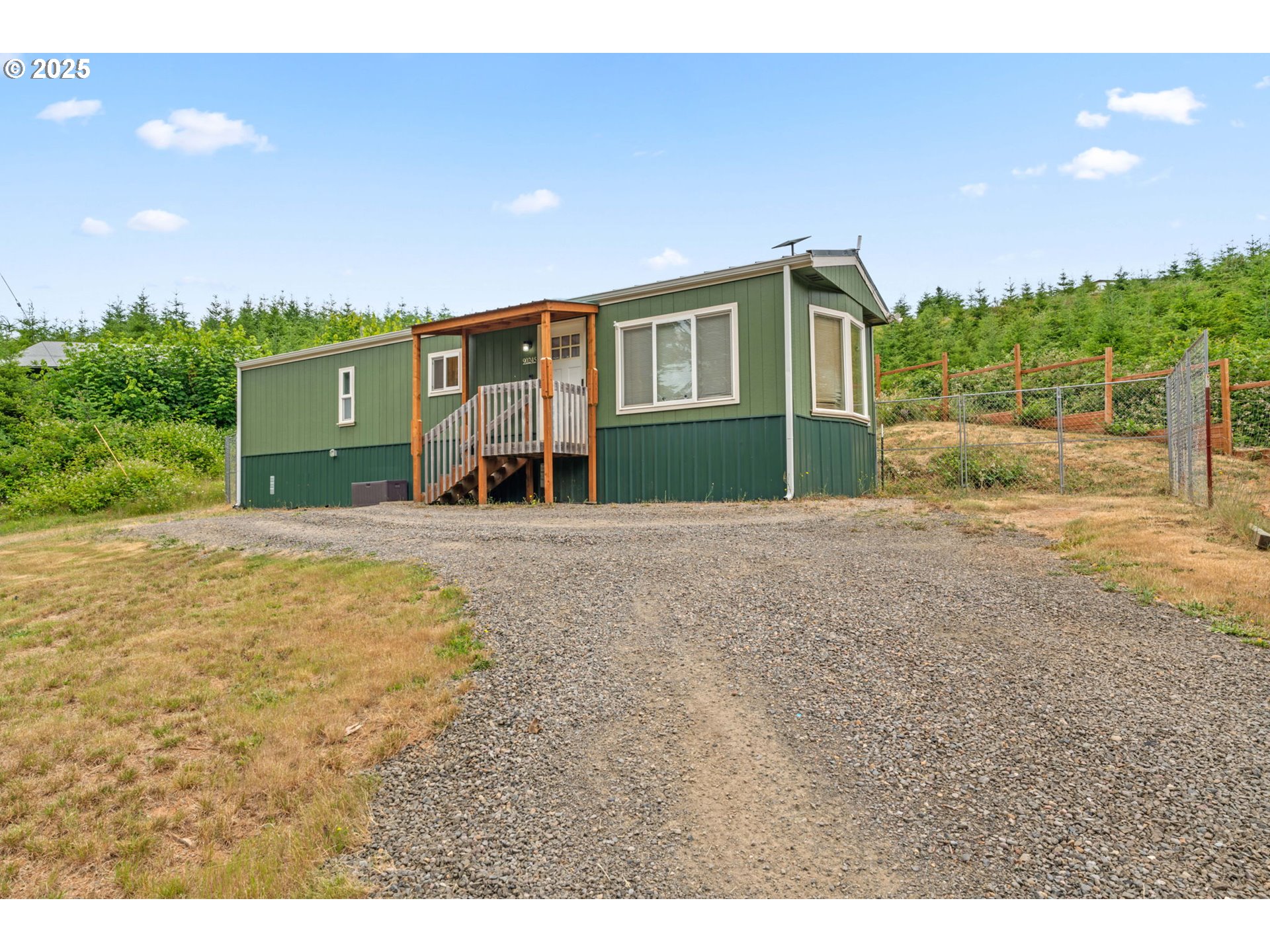 90245 Sheffler Road Elmira, OR 97437 - Photo 17 of 33 a front view of a house with a yard
