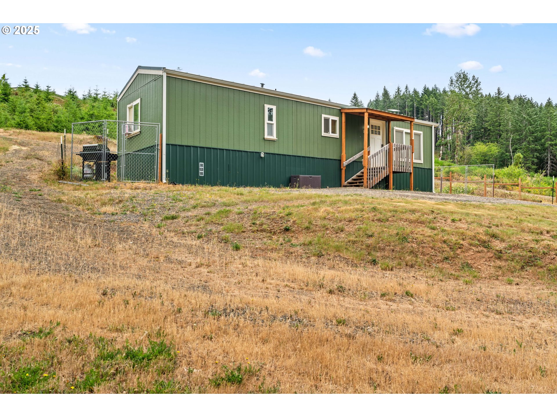90245 Sheffler Road Elmira, OR 97437 - Photo 19 of 33 a front view of a house with a yard