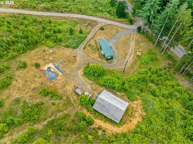 a view of a field with an ocean