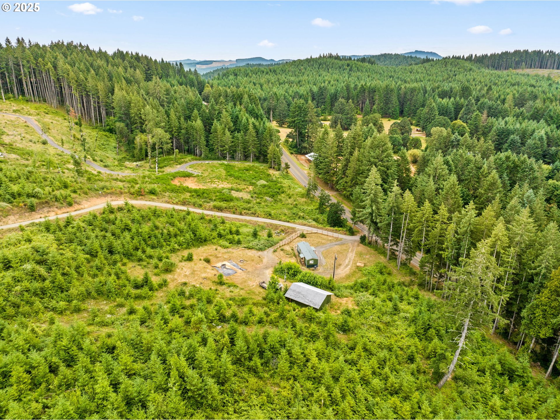 90245 Sheffler Road Elmira, OR 97437 - Photo 29 of 33 a view of a field with an ocean
