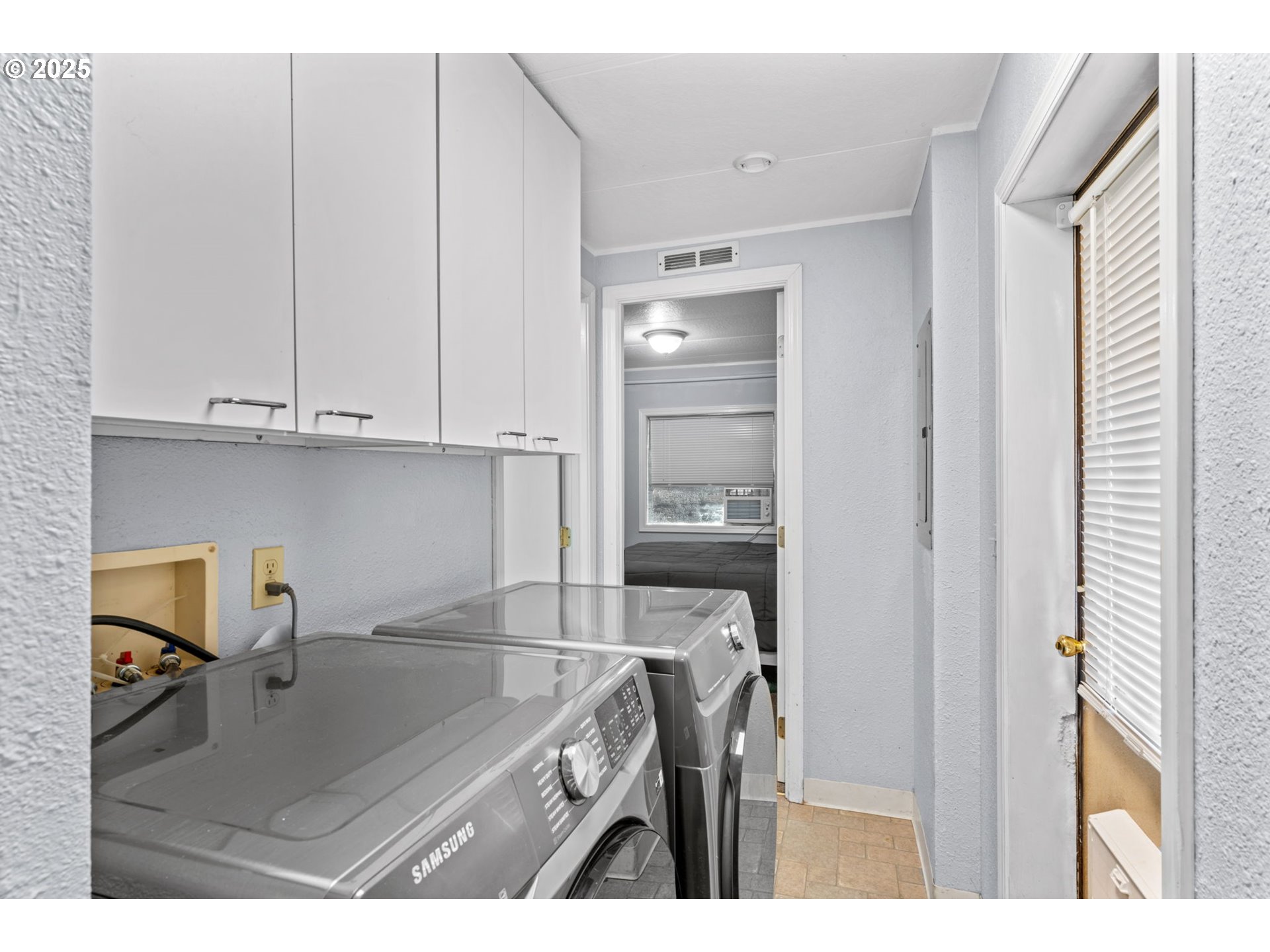 90245 Sheffler Road Elmira, OR 97437 - Photo 9 of 33 a kitchen with a sink cabinets and appliances