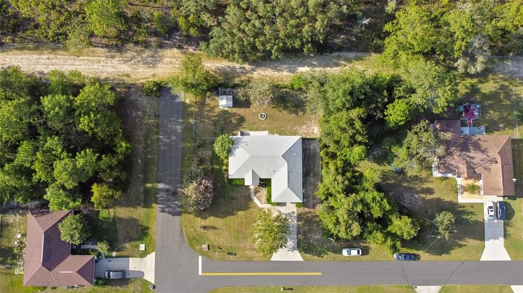 5065 Southwest 128th Street Ocala, FL 34473 - Photo 23 of 31 an aerial view of residential house with outdoor space