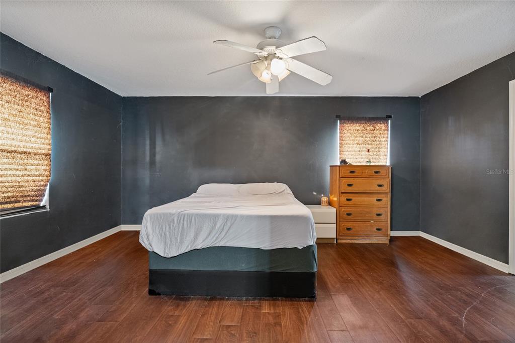 5065 Southwest 128th Street Ocala, FL 34473 - Photo 7 of 31 a living room with a bed furniture and a window