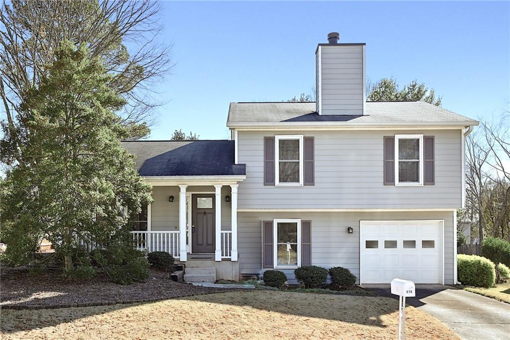876 Wheatfields Court Decatur, GA 30030 - Photo 1 of 1 a front view of a house with a yard