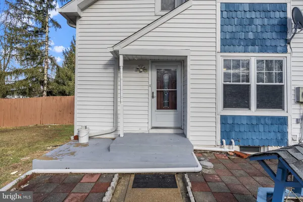 a view of house with yard