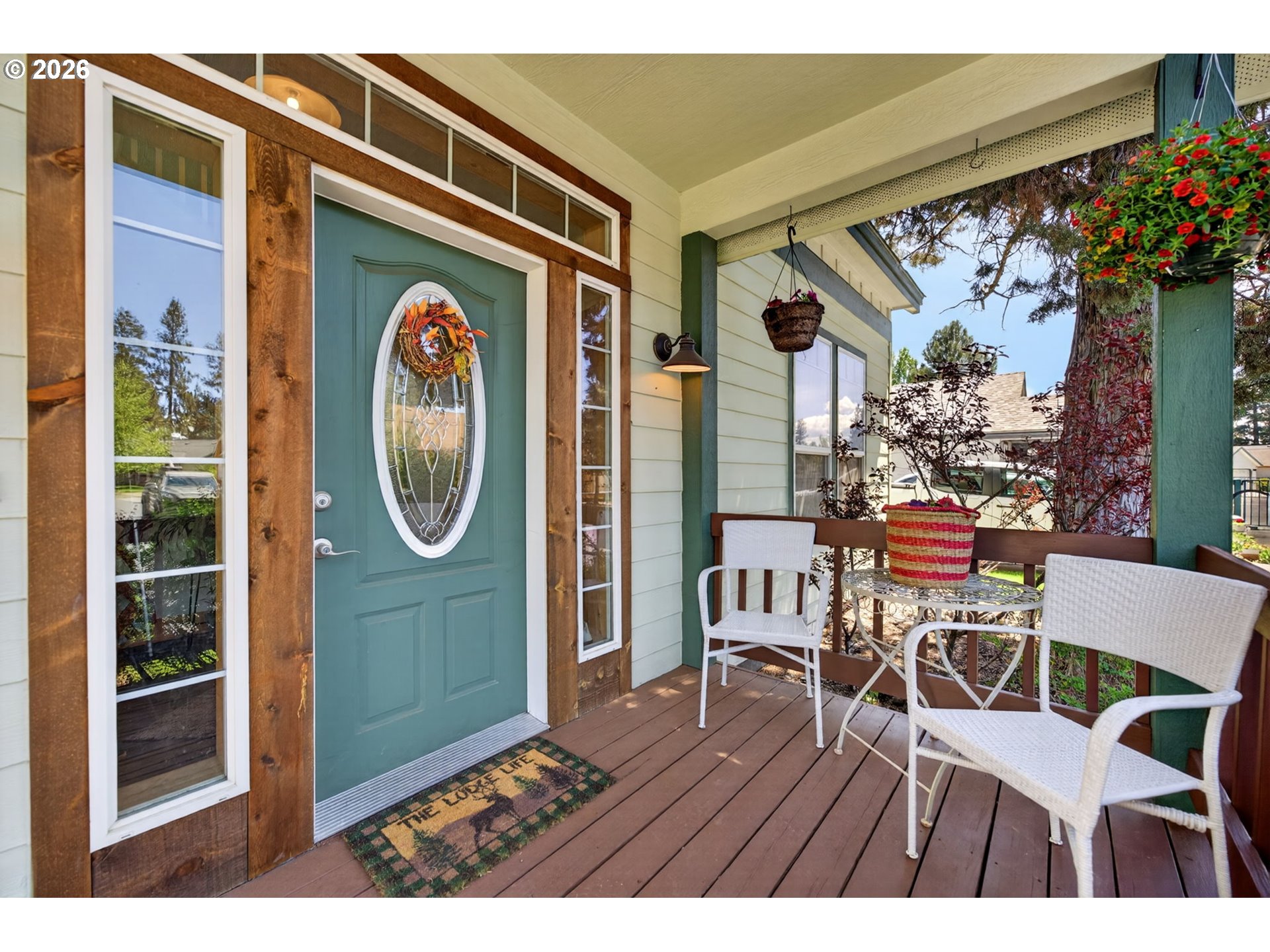 538 North Tam Rim Drive Sisters, OR 97759 - Photo 6 of 45 a view of a wooden door with a dining table and chairs