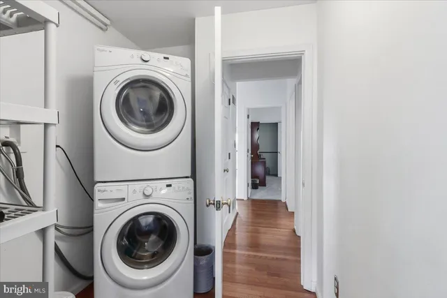 a view of a livingroom with furniture and a window