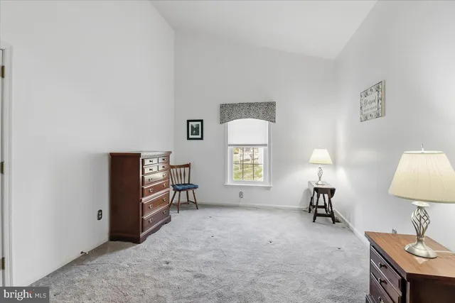 a view of game room with window and furniture