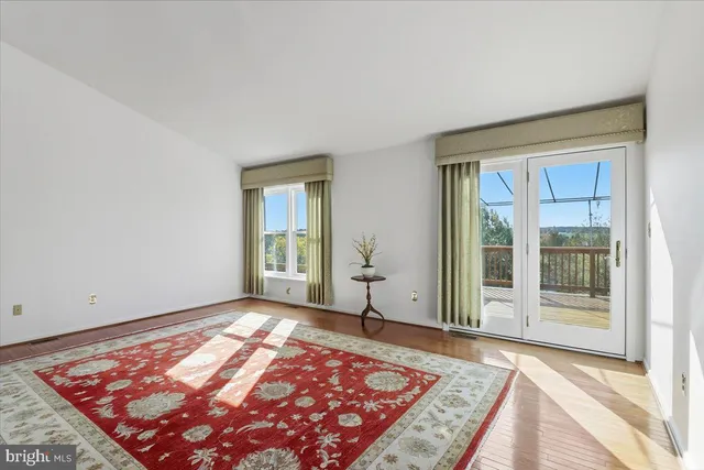 a view of an empty room and window