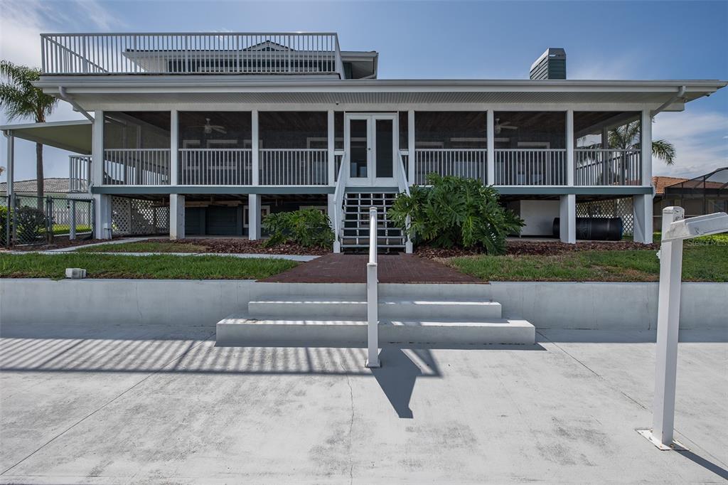 3150 Trident Terrace New Port Richey, FL 34652 - Photo 57 of 99 a front view of building with street