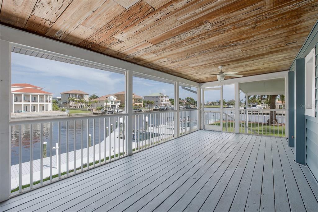 3150 Trident Terrace New Port Richey, FL 34652 - Photo 59 of 99 a view of a balcony with wooden floor