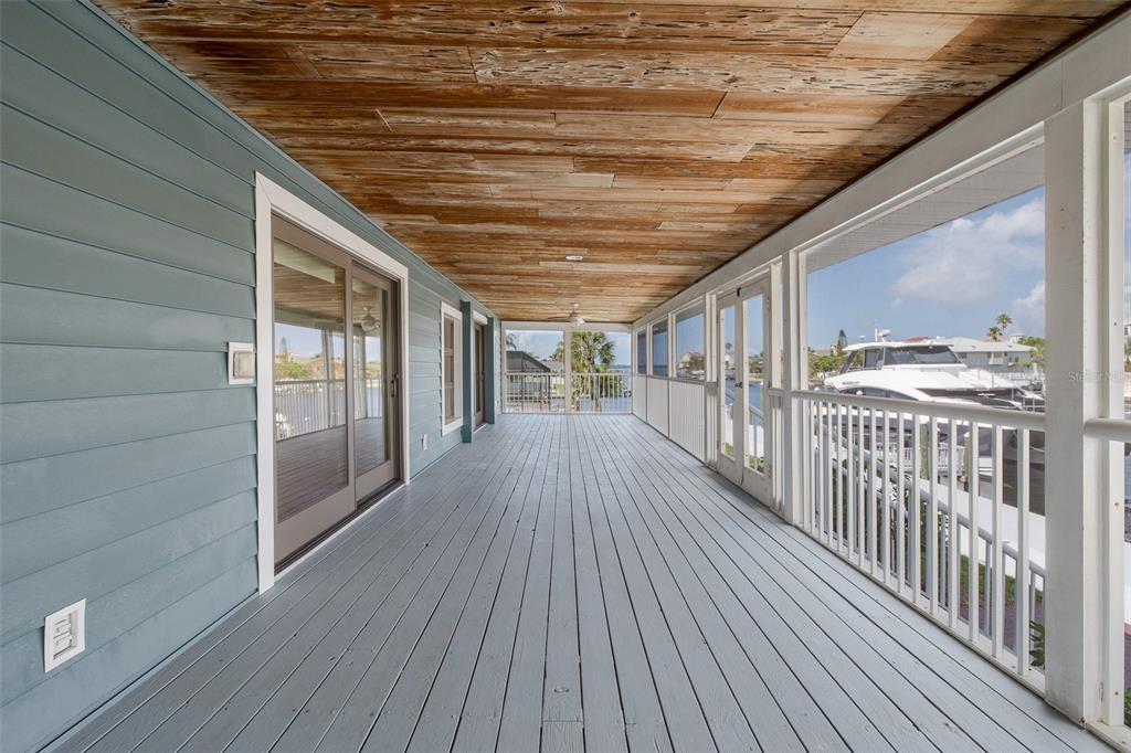 3150 Trident Terrace New Port Richey, FL 34652 - Photo 60 of 99 a view of a balcony with wooden floor