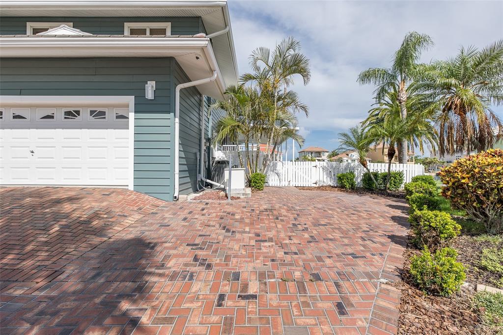3150 Trident Terrace New Port Richey, FL 34652 - Photo 6 of 99 a front view of a house with a yard