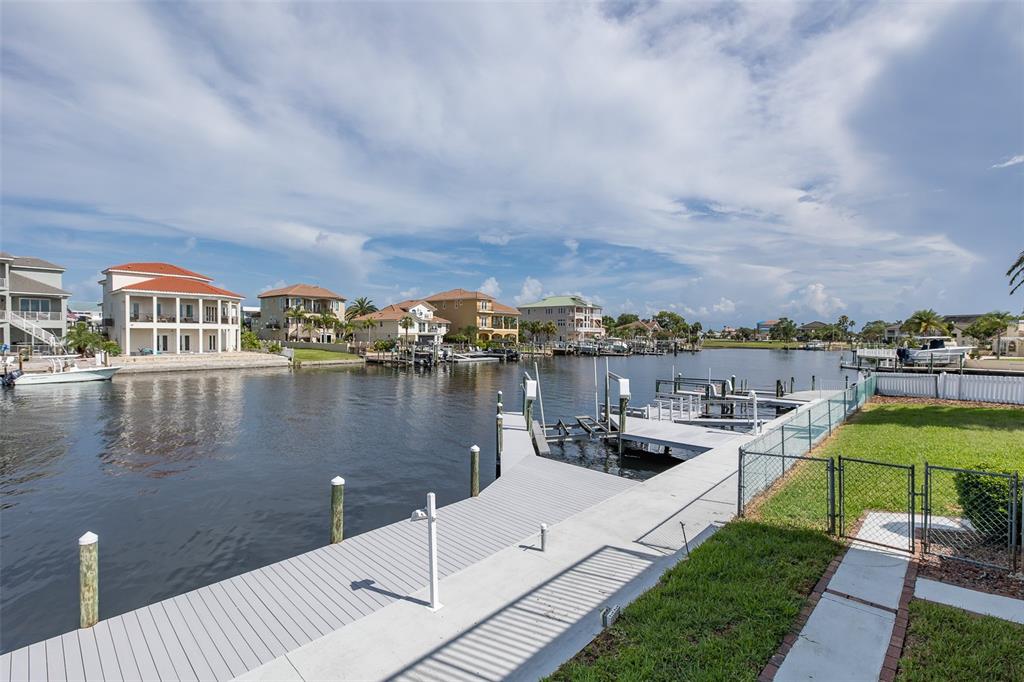 3150 Trident Terrace New Port Richey, FL 34652 - Photo 73 of 99 a view of a lake with a terrace
