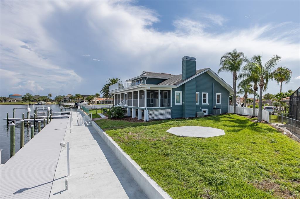 3150 Trident Terrace New Port Richey, FL 34652 - Photo 78 of 99 a view of a house with a swimming pool