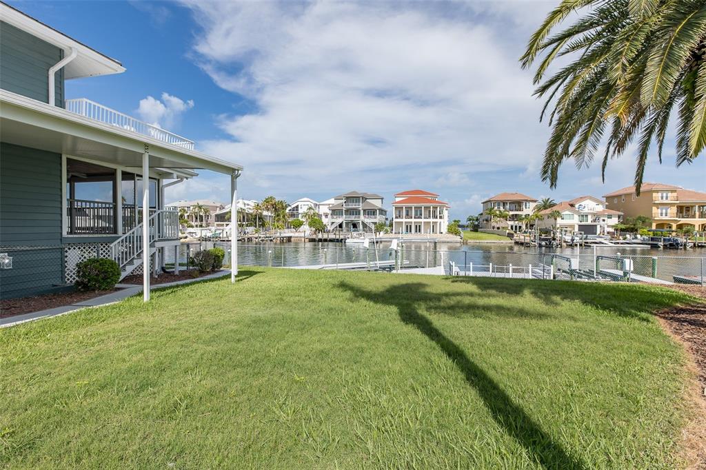 3150 Trident Terrace New Port Richey, FL 34652 - Photo 8 of 99 a view of a house with a yard
