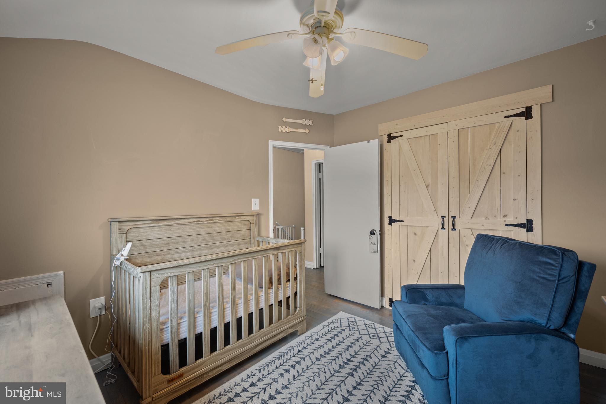 1955 Holborn Road Baltimore, MD 21222 - Photo 20 of 36 a living room with furniture and a chandelier