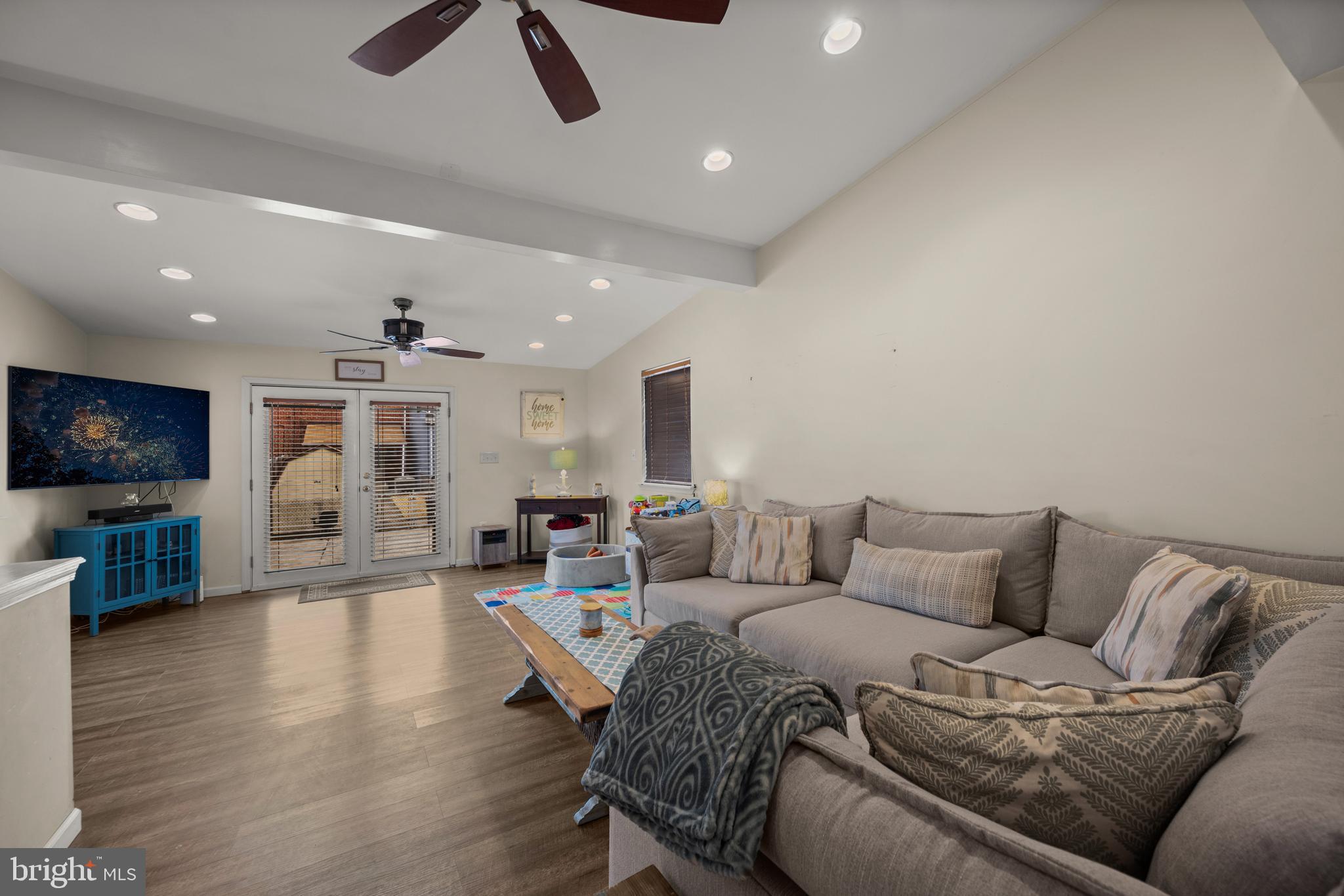1955 Holborn Road Baltimore, MD 21222 - Photo 21 of 36 a living room with furniture and a flat screen tv