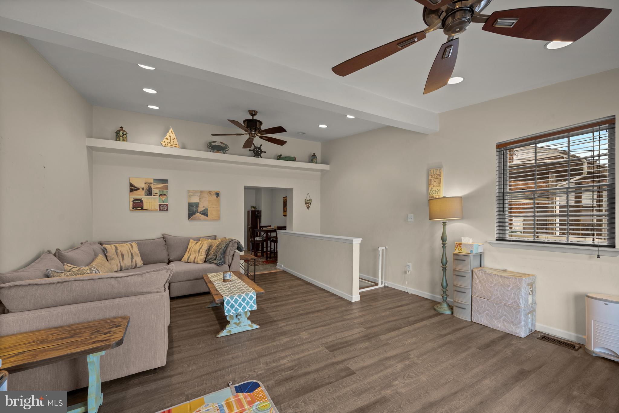 1955 Holborn Road Baltimore, MD 21222 - Photo 23 of 36 a living room with furniture and a wooden floor