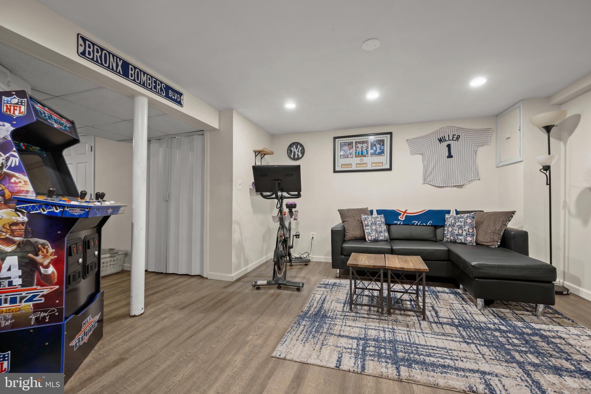 1955 Holborn Road Baltimore, MD 21222 - Photo 26 of 36 a living room with furniture a flat screen tv and a fireplace