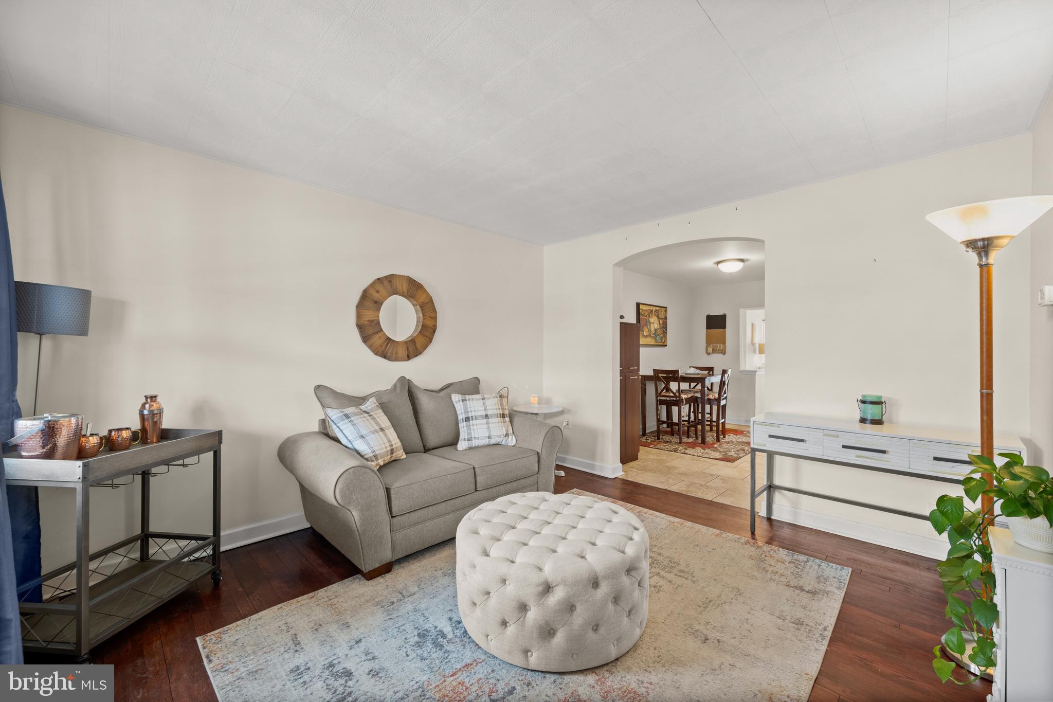 1955 Holborn Road Baltimore, MD 21222 - Photo 4 of 36 a living room with furniture and a wooden floor