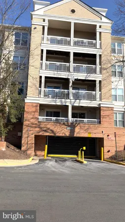 a front view of a building with glass windows