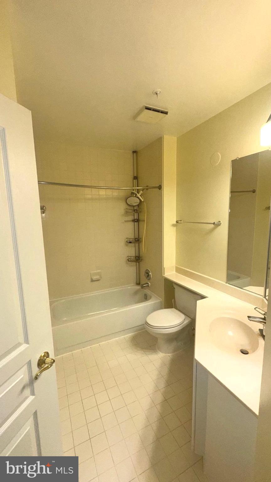 12919 Alton Square, Unit 203 Herndon, VA 20170 - Photo 16 of 22 a bathroom with a sink a toilet and shower