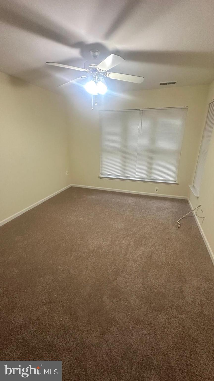 12919 Alton Square, Unit 203 Herndon, VA 20170 - Photo 19 of 22 a view of an empty room