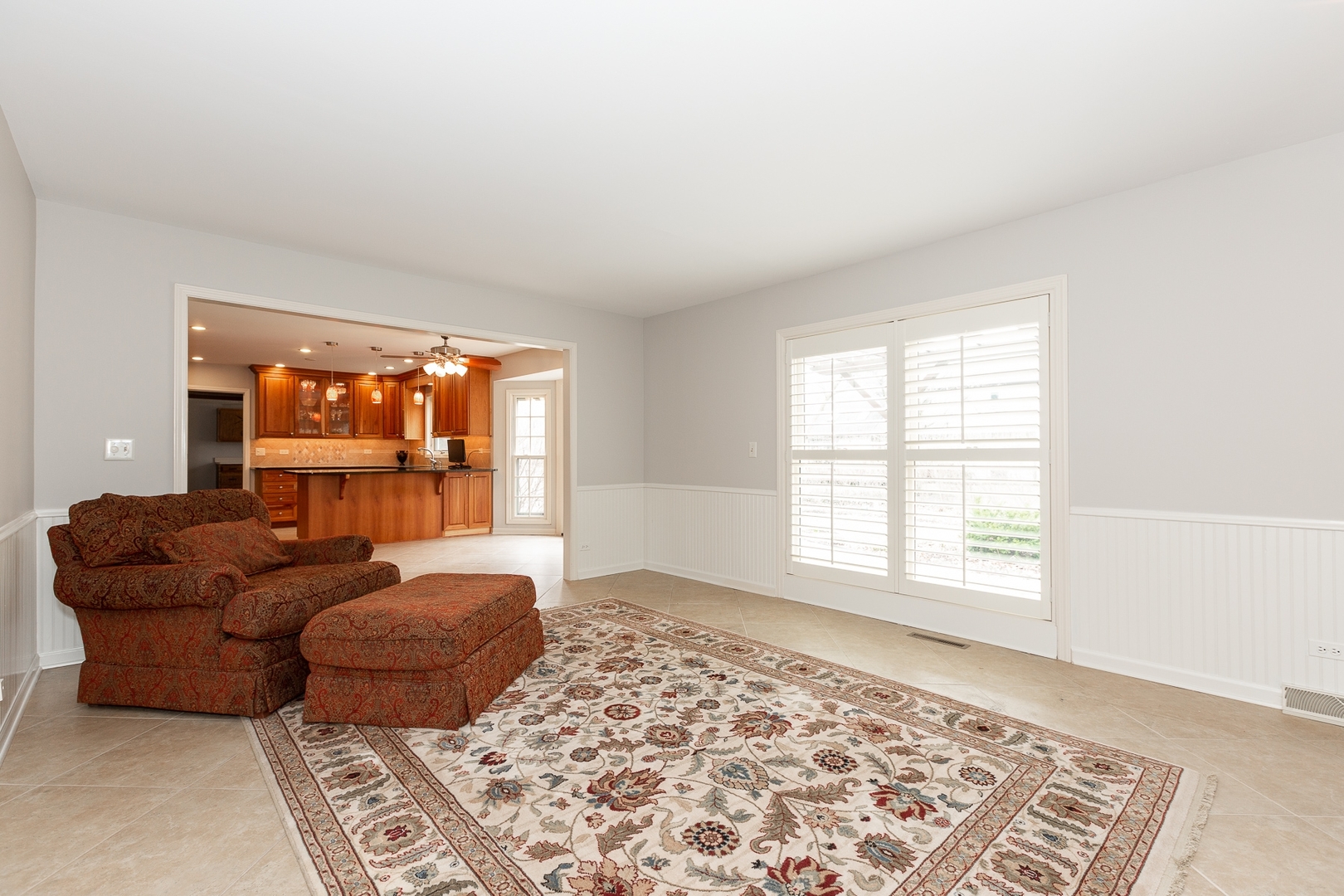 620 Buttonwood Circle Naperville, IL 60540 - Photo 13 of 29 a living room with furniture and a window