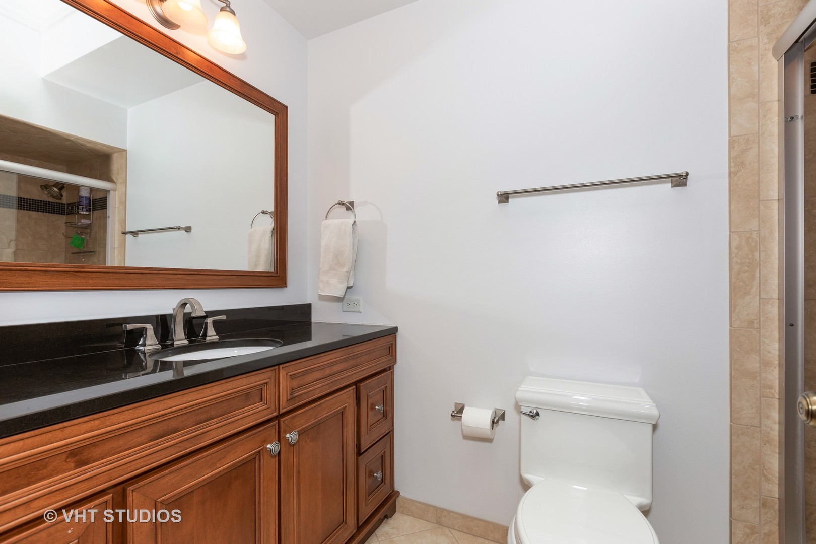 620 Buttonwood Circle Naperville, IL 60540 - Photo 16 of 29 a bathroom with a granite countertop sink mirror and toilet